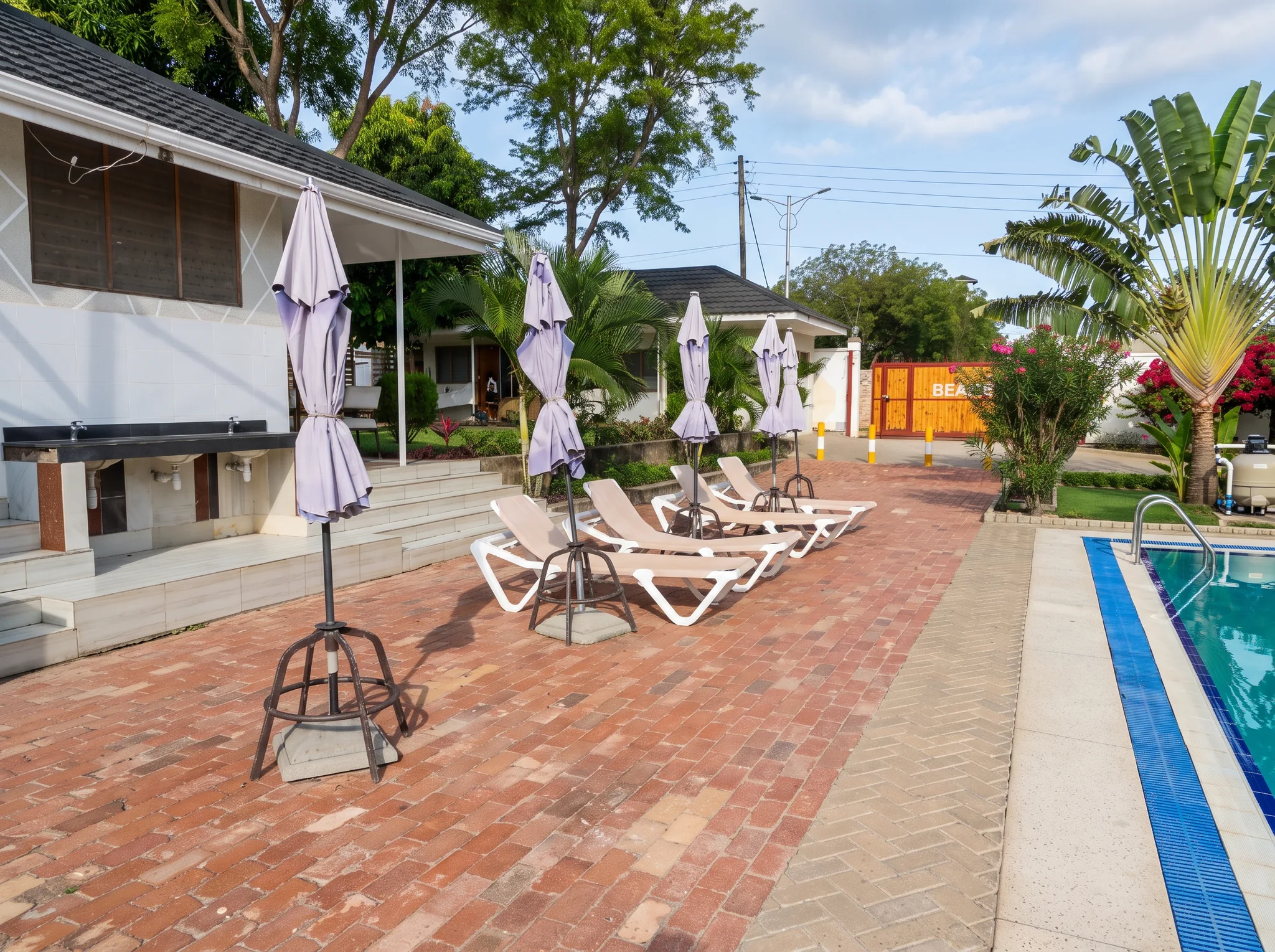 Poolside Sun Loungers and Relaxation Deck